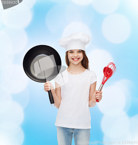 Image of smiling little girl in white blank t-shirt