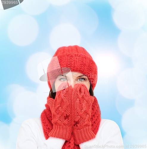 Image of smiling young woman in winter clothes