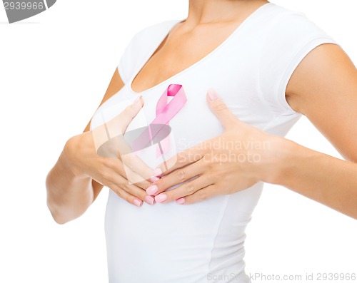 Image of woman with pink cancer awareness ribbon