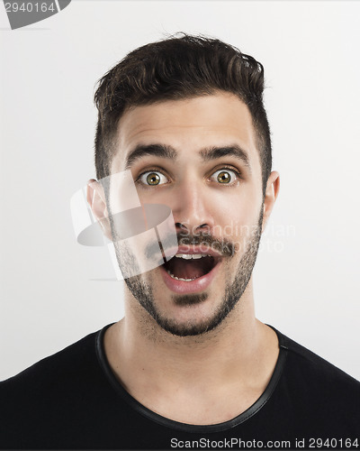 Image of Young man astonished