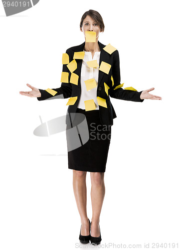 Image of Business woman with yellow paper notes