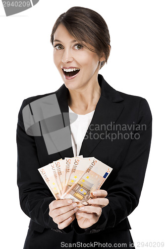 Image of Woman holding euro currency notes