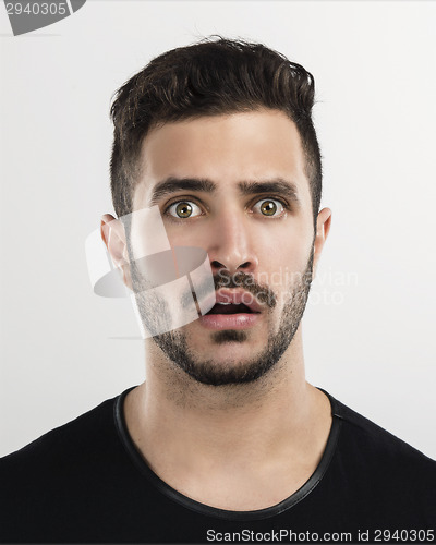 Image of Young man astonished