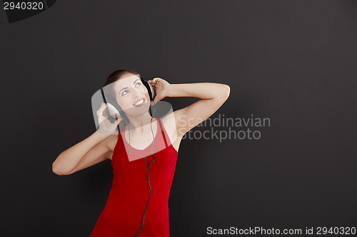 Image of Woman listen music