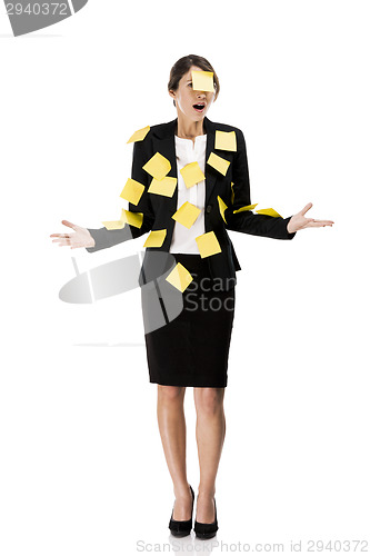 Image of Business woman with yellow paper notes