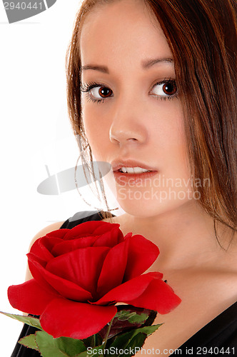 Image of Pretty girl with red rose.