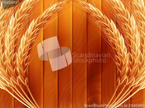 Image of Wheat on wooden autumn background. EPS 10