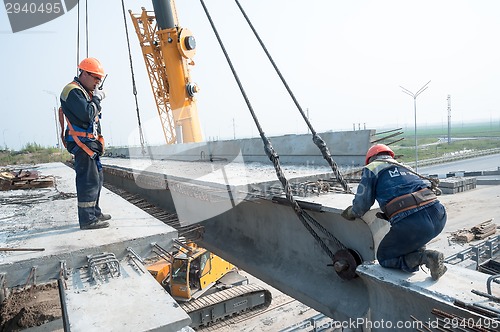 Image of Engineer with radio controls equalization of span