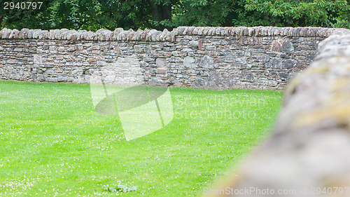 Image of Stone wall in amongst agricultural scenery