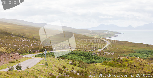 Image of Highlands of Scotland narrow road in mountain landscape