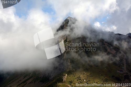 Image of A mountain behind the cloud