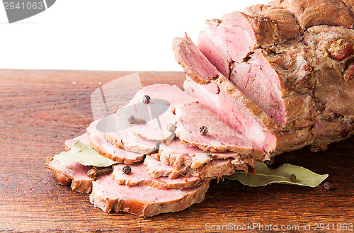 Image of Chopped Boiled Pork On Wooden Board With Spices