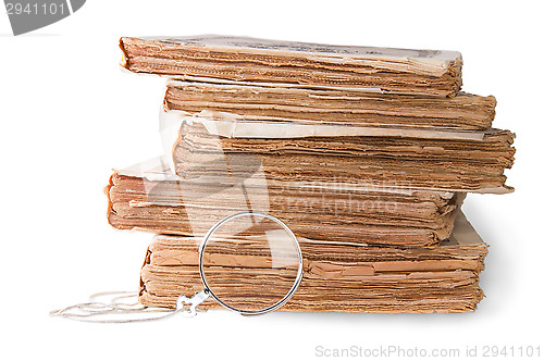 Image of Old Books With Monocle