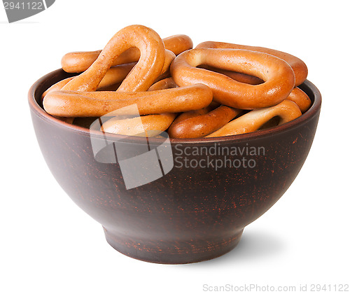 Image of Tasty Oval Bagels Into Ceramic Bowl