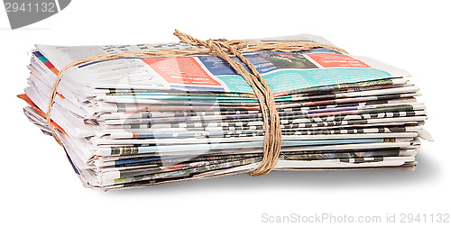 Image of Stack Of Newspapers Bandaged Rope