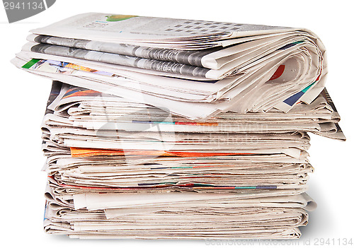 Image of Stack Of Newspapers And The Roll