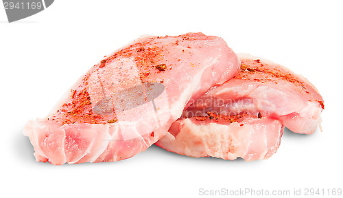 Image of Heap Of Three Pieces Of Raw Pork With Spices