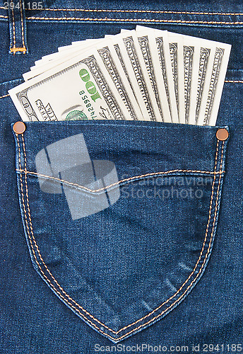 Image of Some Dollars In A Pocket Of Jeans