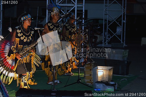 Image of street musicians before the song