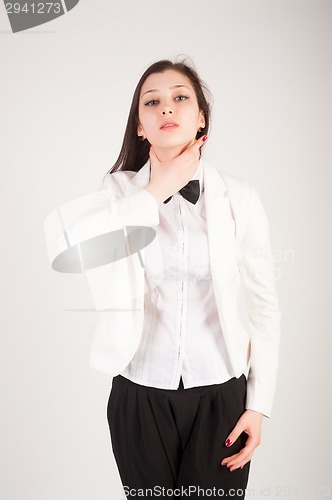 Image of Depressed young businesswoman with sore throat