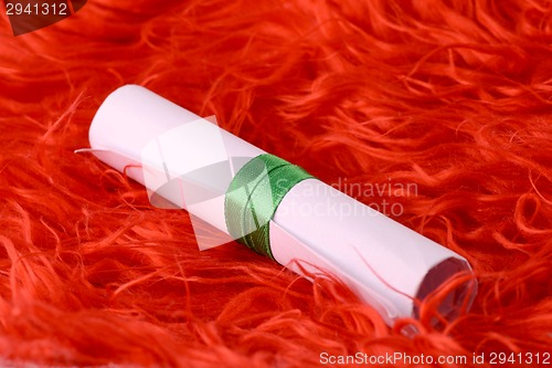 Image of Greeting card with white paper and green bow