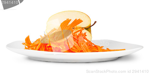 Image of Half An Apple With Grated Carrot On White Plate