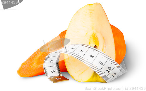 Image of Slices Carrot With Apple And Sewing Measuring