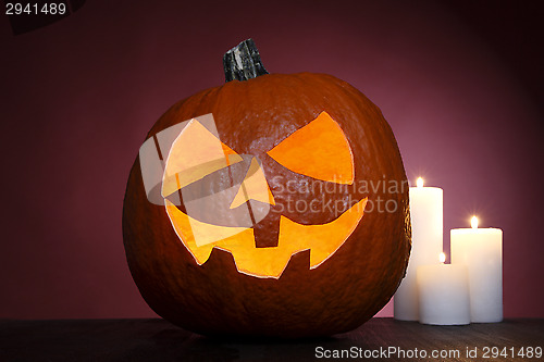 Image of Pumpkin with candles for Halloween