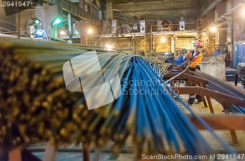 Image of Worker in reinforcing shop