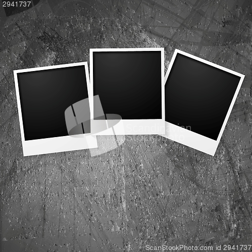 Image of Polaroid photo frames on grunge wall