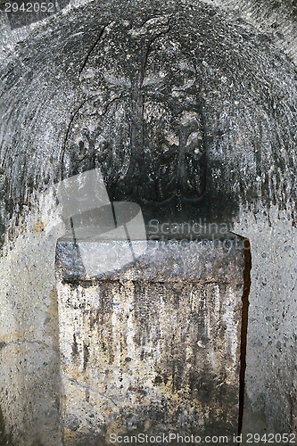 Image of The altar part of the church with the carved cross in Geghard