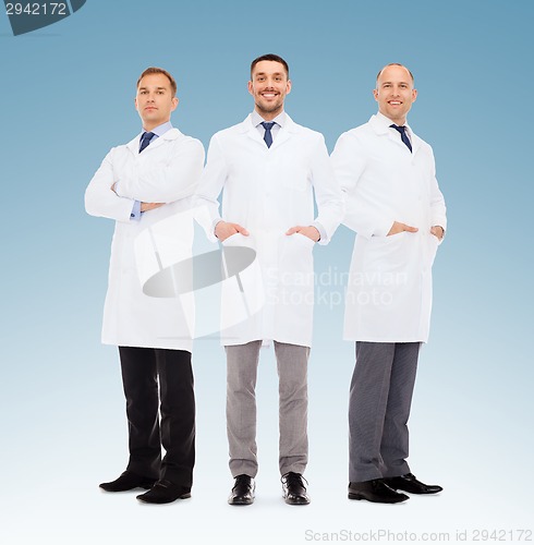 Image of group of smiling male doctors in white coats