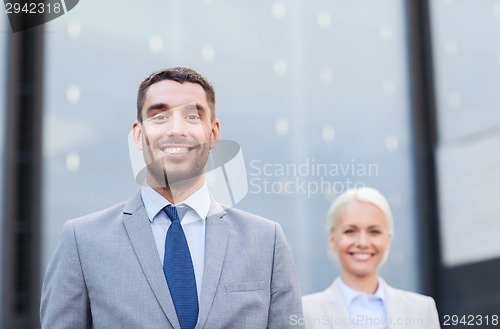 Image of close up of smiling businessmen