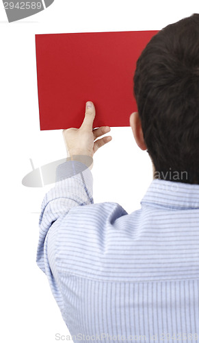 Image of Man holding a paper