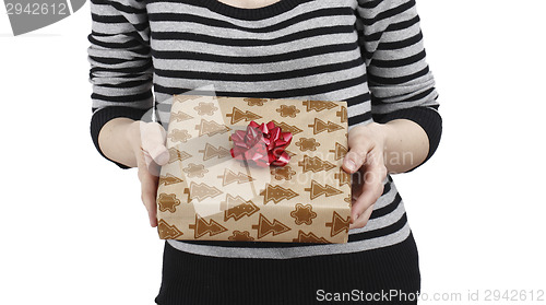 Image of Young woman holding a present