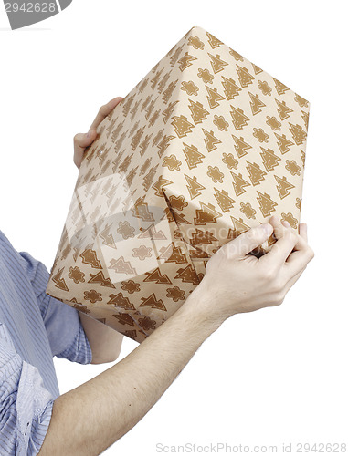 Image of Young man holding a present