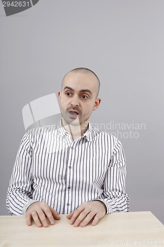 Image of Man at desk