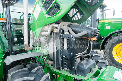 Image of Tractor with open cowl. Tyumen. Russia