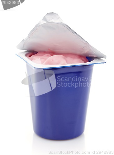 Image of fresh pink berry yogurt in blue plastic pot