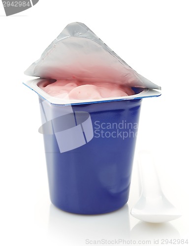 Image of fresh pink berry yogurt in blue plastic pot