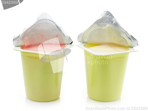 Image of two plastic yogurt pots