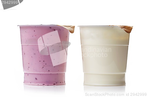 Image of two plastic yogurt pots