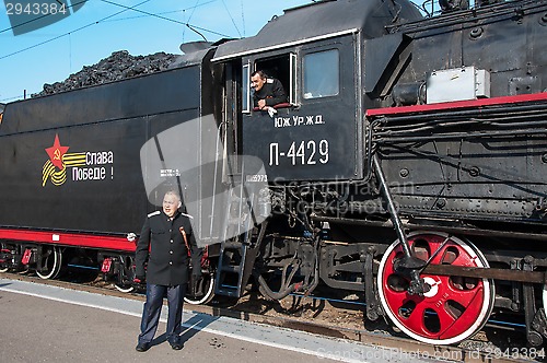 Image of Vintage steam locomotive at the station of Orenburg