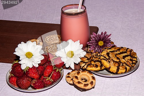 Image of Strawberries milkshake and cookies