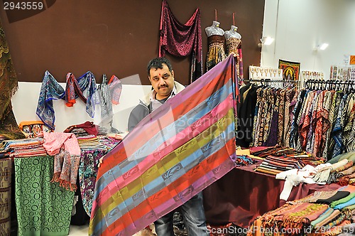 Image of The seller of the colonial goods from India