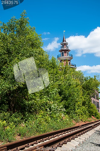 Image of The rails of the railway and the facade of the building