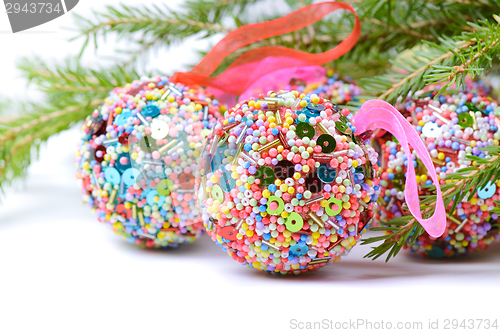 Image of Christmas balls with green spruce