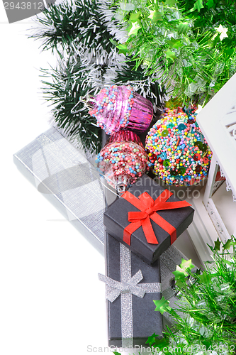 Image of Top view on christmas present boxes and tinsel