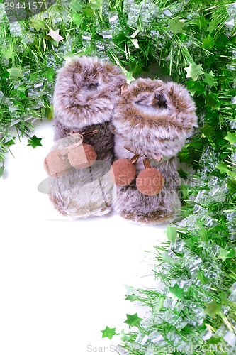 Image of Snow boots with green tinsel