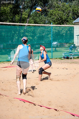 Image of Beach volleyball play girls